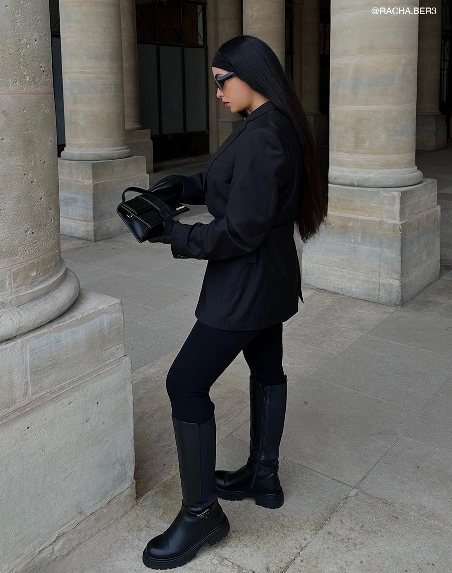 Bottes femme noires fourrées à semelle crantée, élastiquées avec sangle boucle cadenas