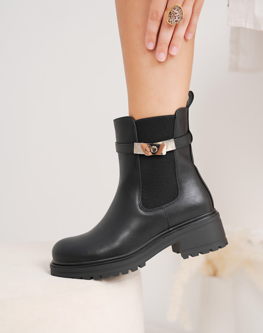 Bottines femme noires style Chelsea à lanière argentée et semelle crantée