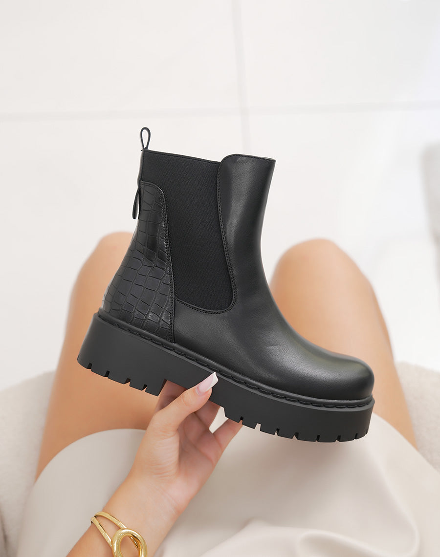 Bottines chelsea noires à effet croco et semelle plateforme