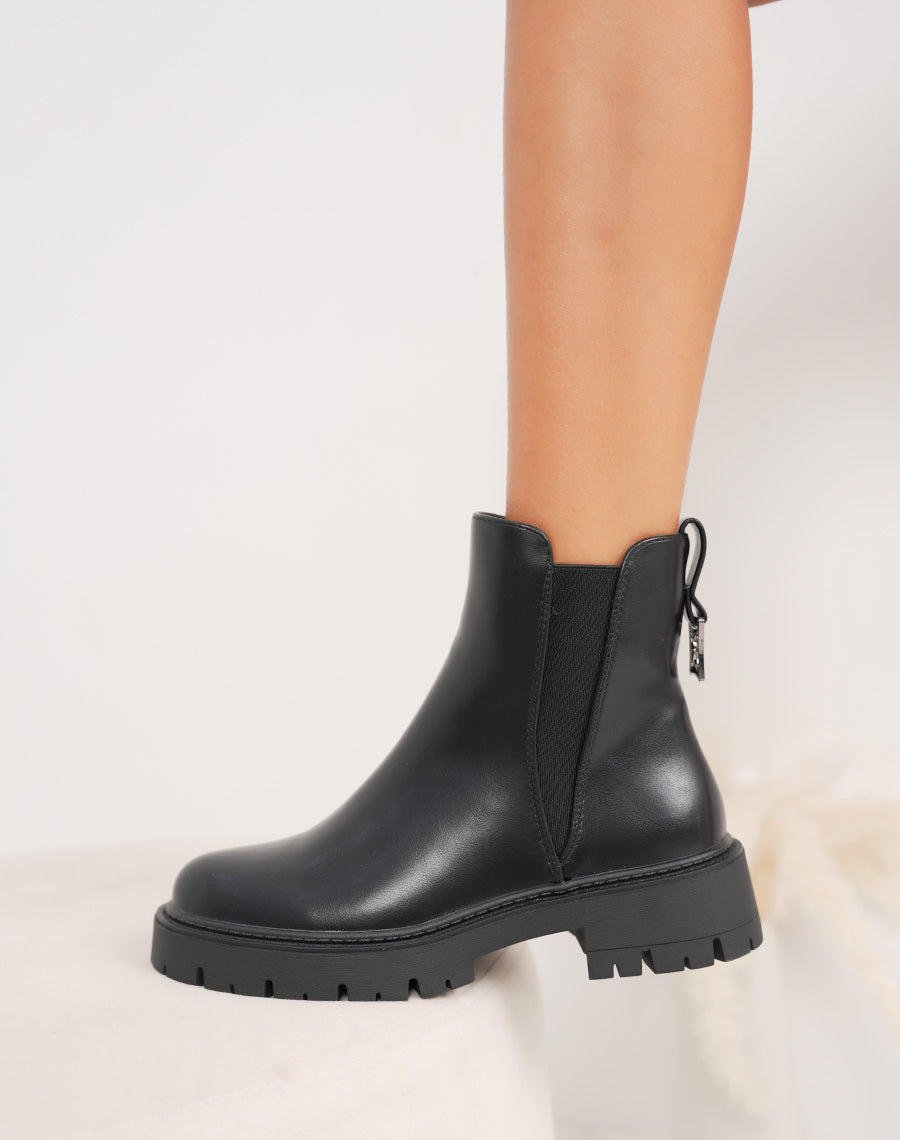 Bottines noires fourrées bijou argenté