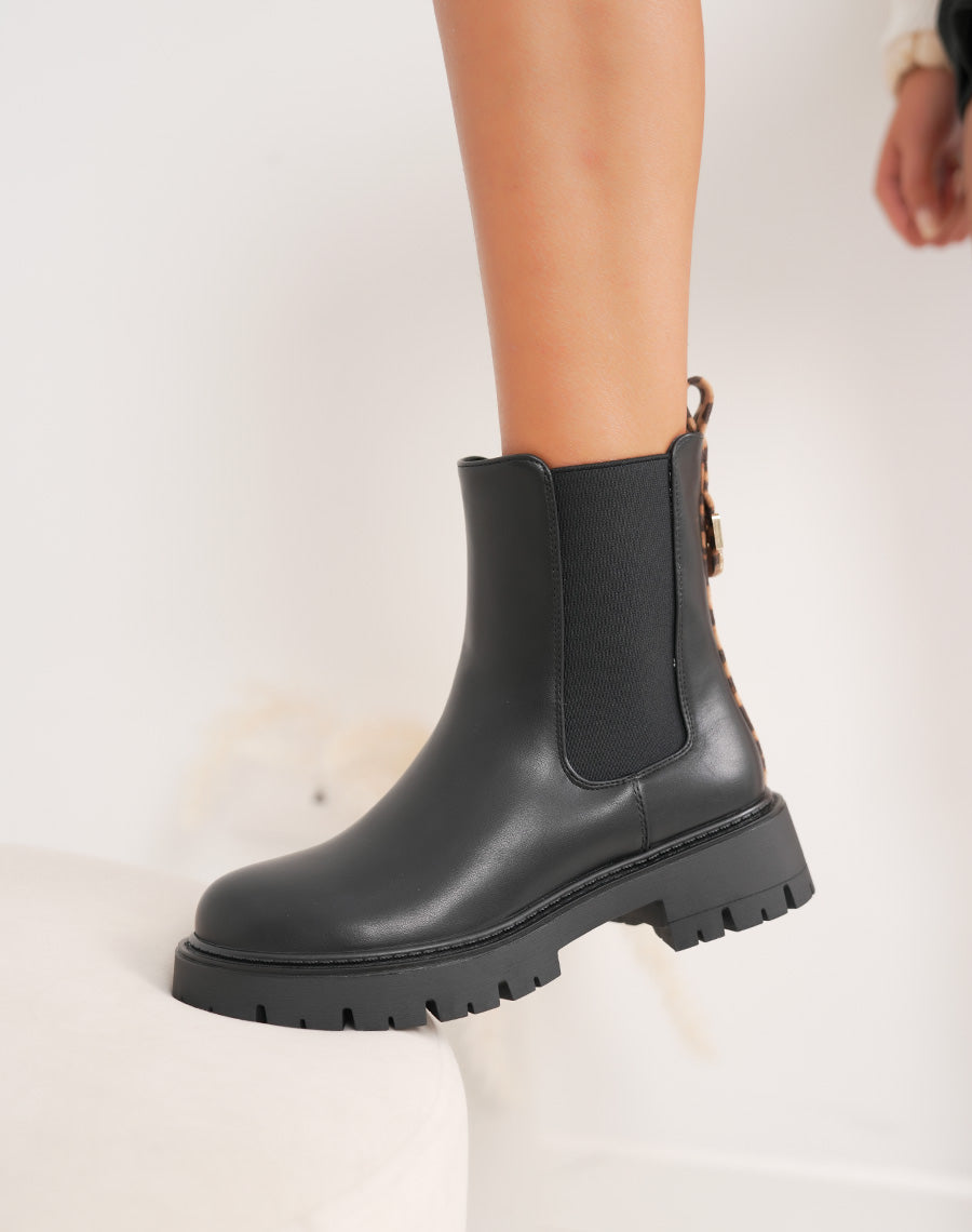 Bottines femme noires style Chelsea avec détail léopard et semelle crantée