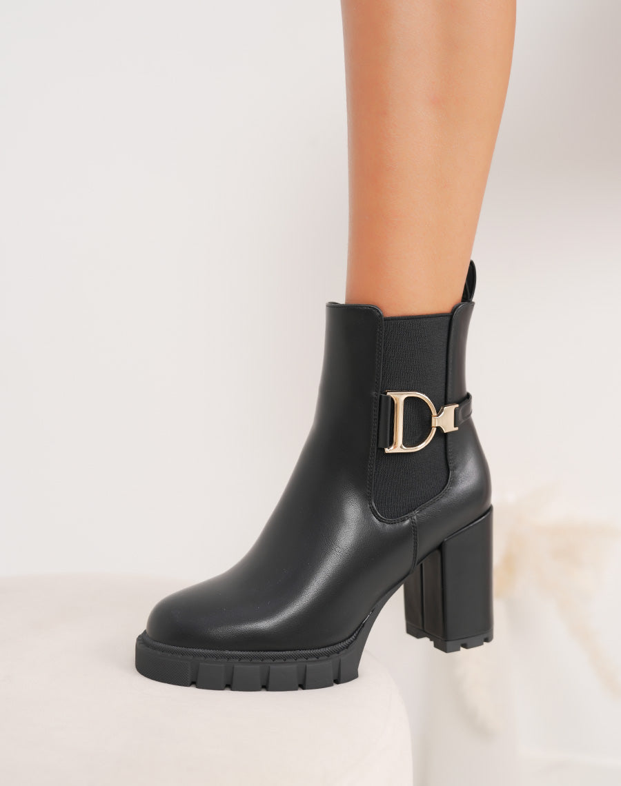 Bottines femme noires style Chelsea à talons hauts avec détail doré et semelle crantée