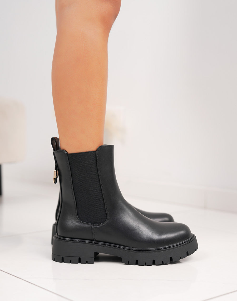 Bottines femme noires élégantes style chelsea avec boucle dorée et semelle crantée