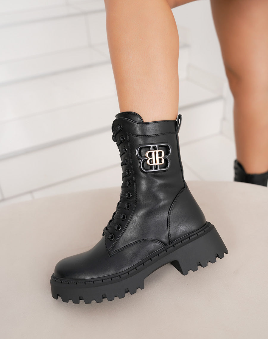 Bottines noires à lacets fourrées avec détail doré