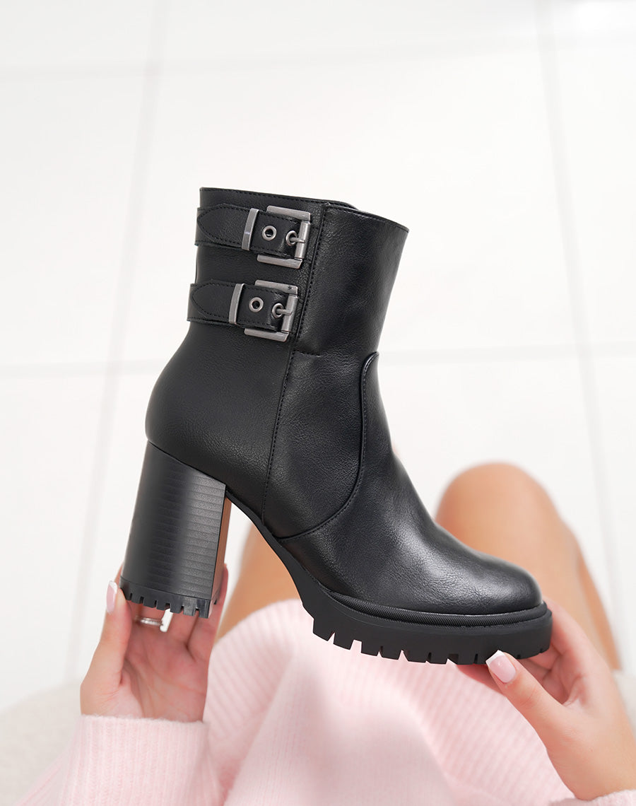 Bottines femme noires à double boucles semelle crantée et intérieur fourré