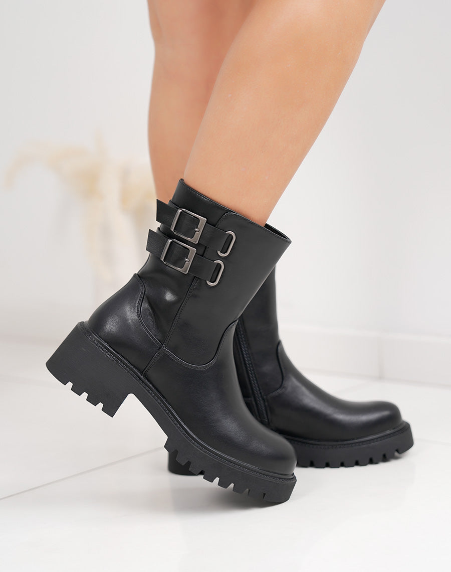 Bottines noires hautes à doubles sangles et semelle crantée