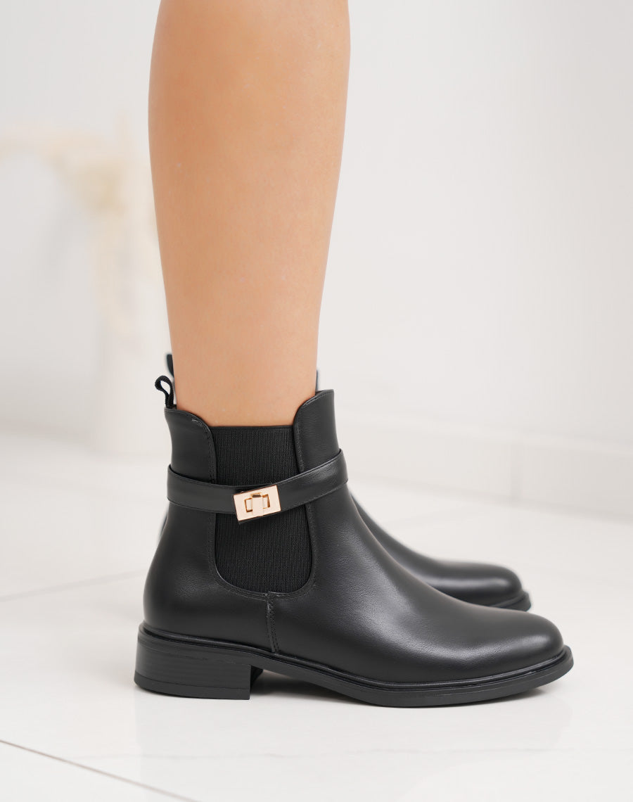 Bottines noires chelsea avec boucle dorée décorative