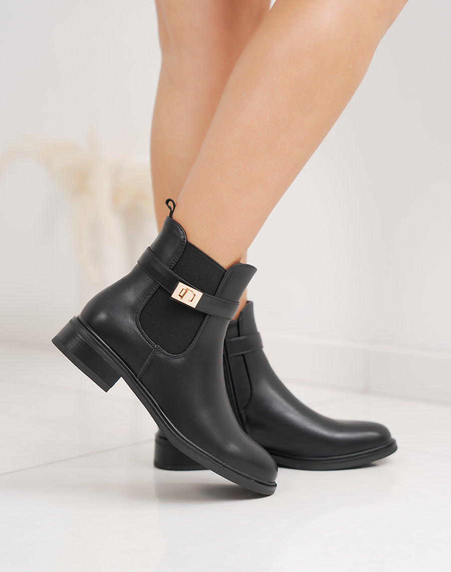Bottines noires chelsea avec boucle dorée décorative