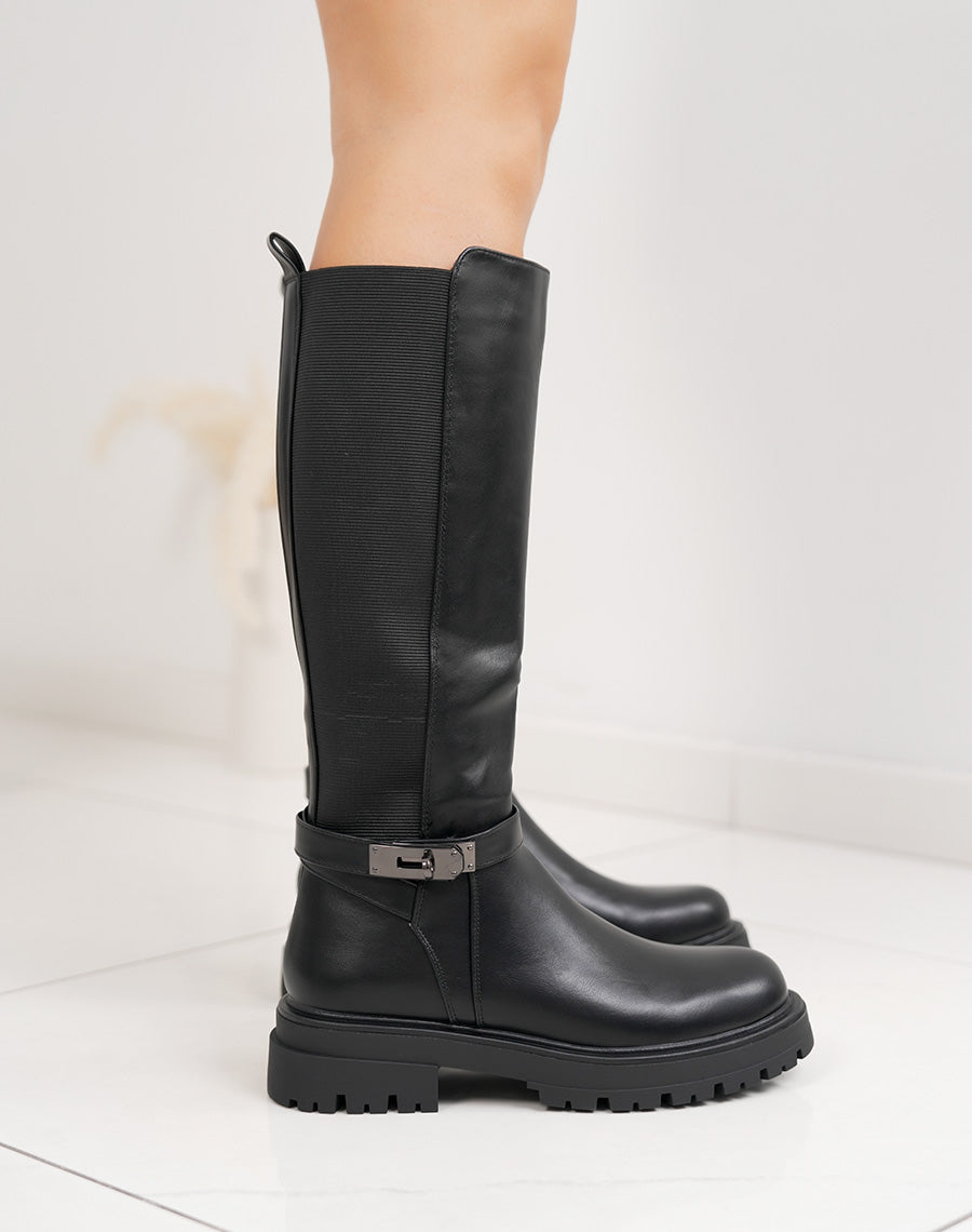 Bottes femme noires fourrées à semelle crantée, élastiquées avec sangle boucle cadenas