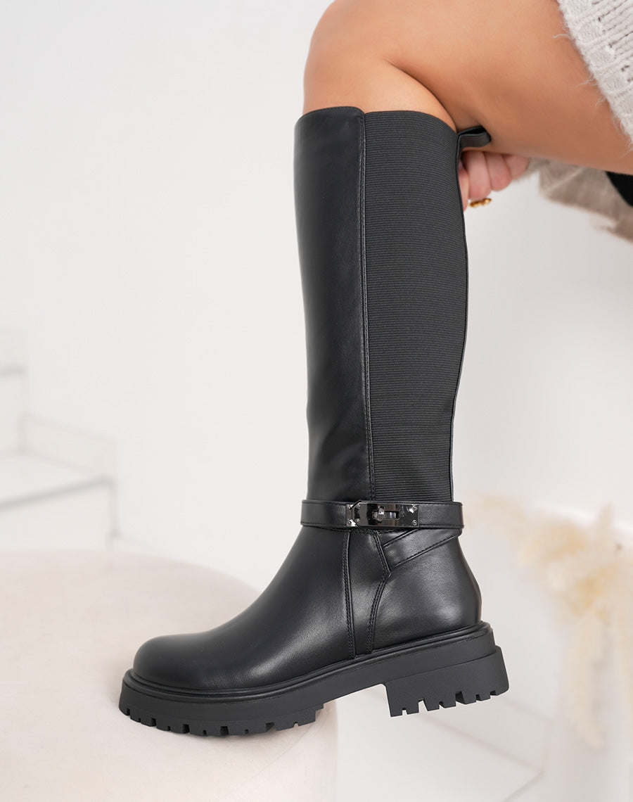Bottes femme noires fourrées à semelle crantée, élastiquées avec sangle boucle cadenas