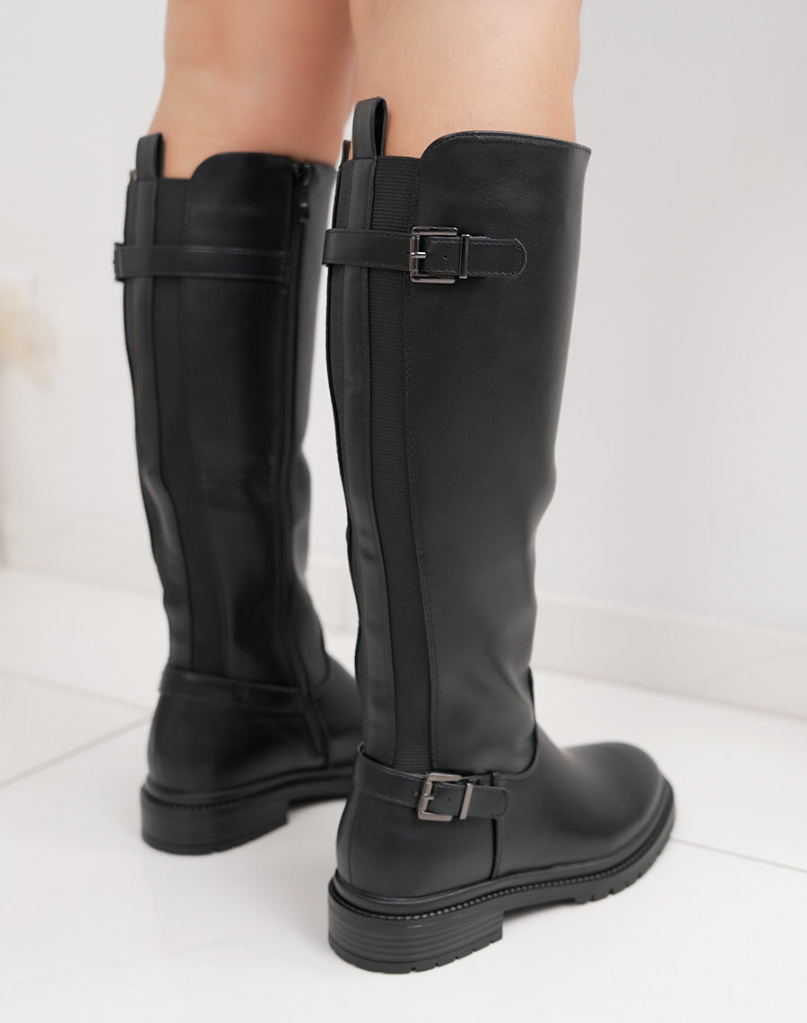 Bottes femme noires à élastique, semelle crantée et sangle décorative