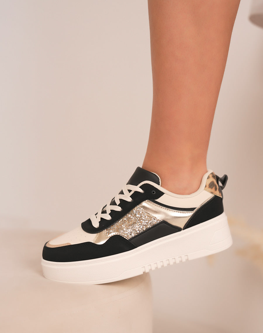 Baskets femme beiges et noires tendance avec paillettes dorées et détails léopard