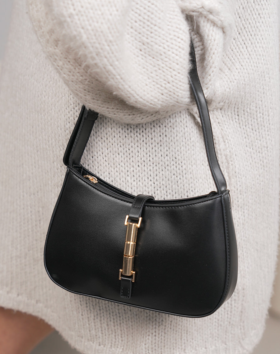 Sac pochette femme noir en similicuir avec fermeture dorée aimantée élégante