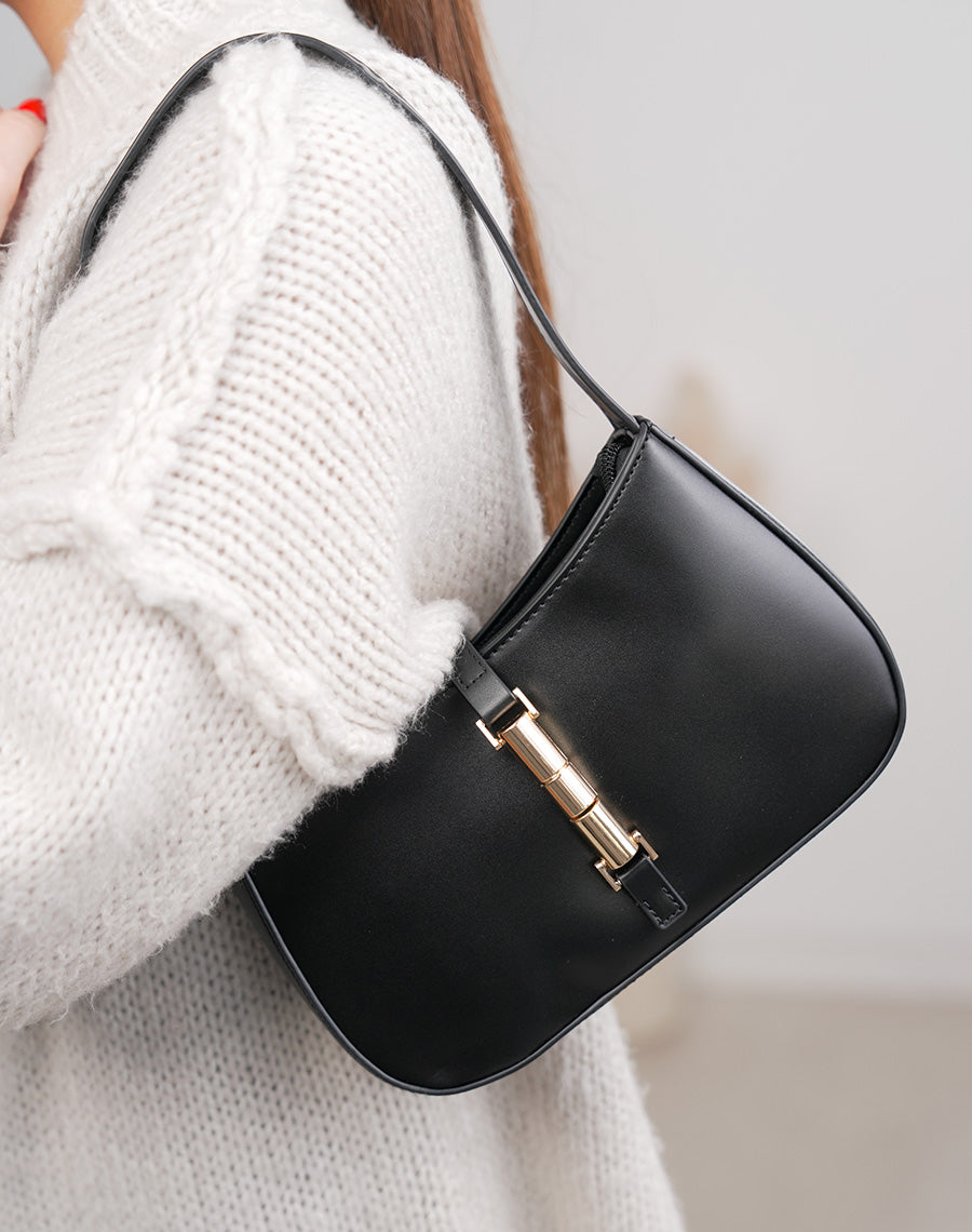 Sac pochette femme noir en similicuir avec fermeture dorée aimantée élégante