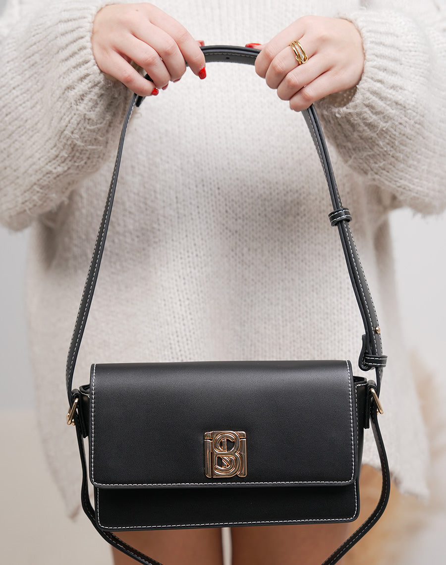 Sac noir à détail doré avec fermeture aimantée