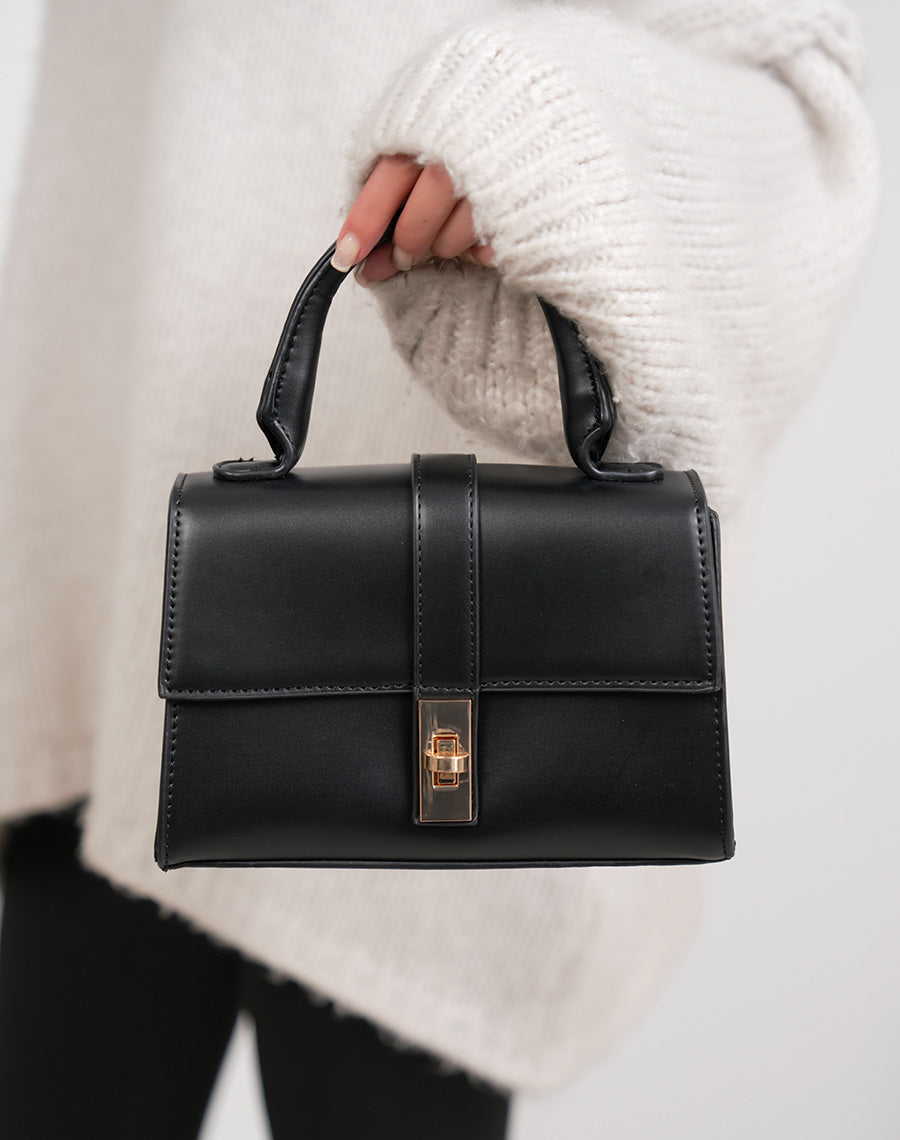 Sac à main femme noir élégant en similicuir avec fermeture tourniquet doré