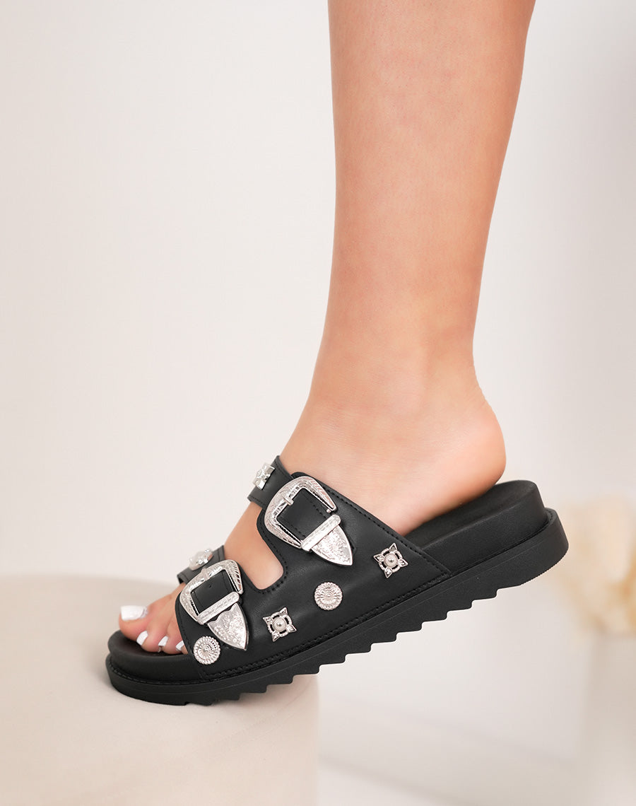 Mules plates femme noires tendance avec détails argentés ajustables