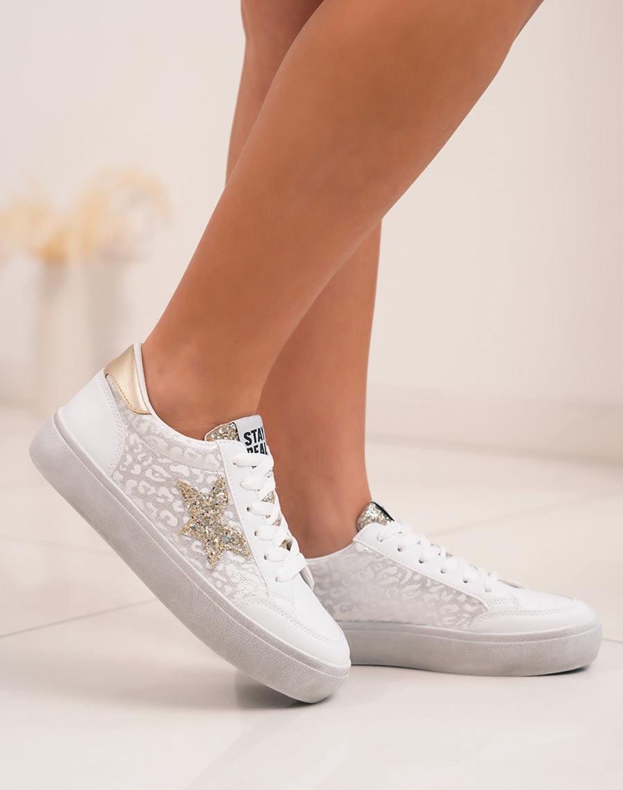 Elegant white women's sneakers with glitter stars and golden details