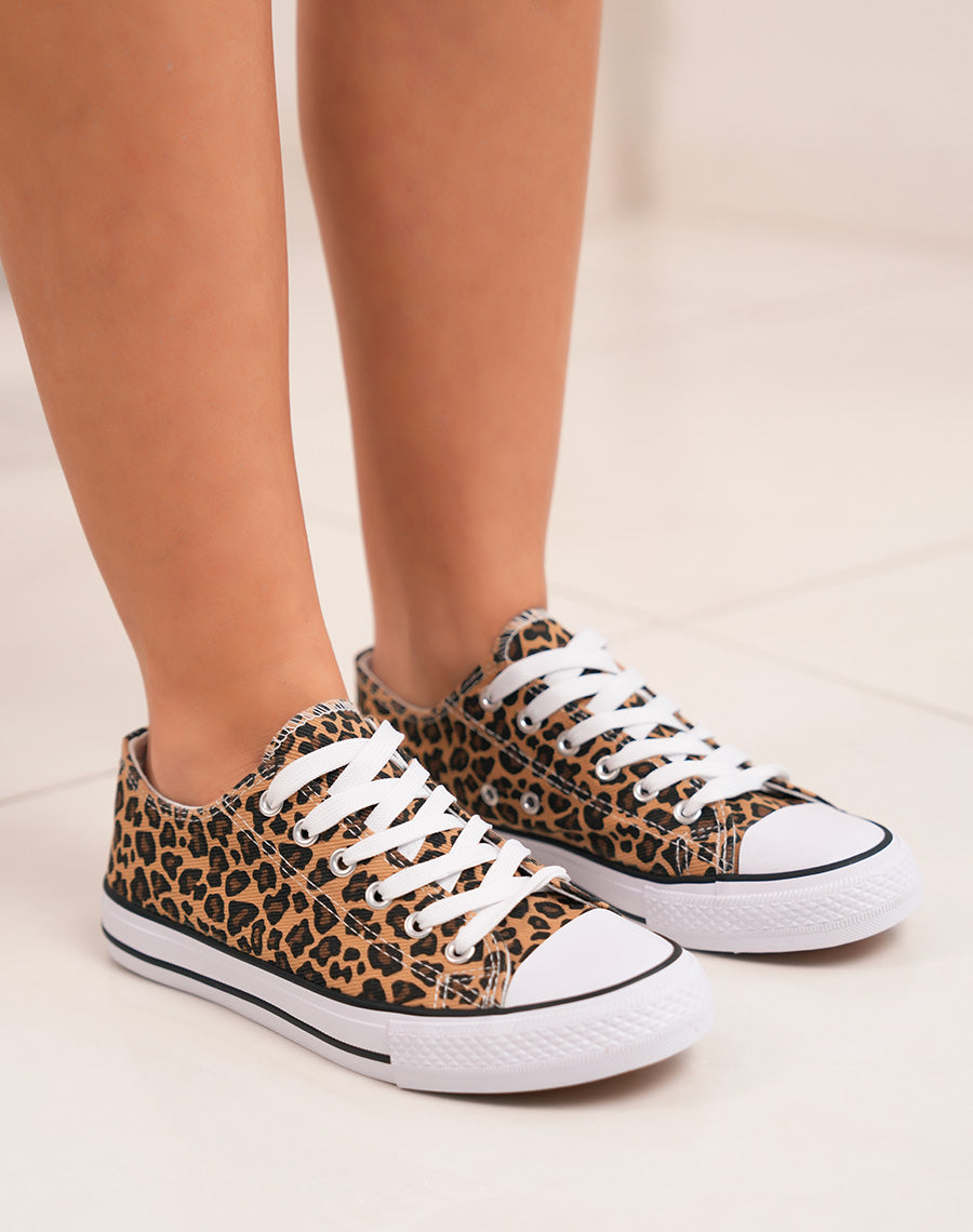 Baskets femme basses tendance à imprimé léopard et semelle blanche
