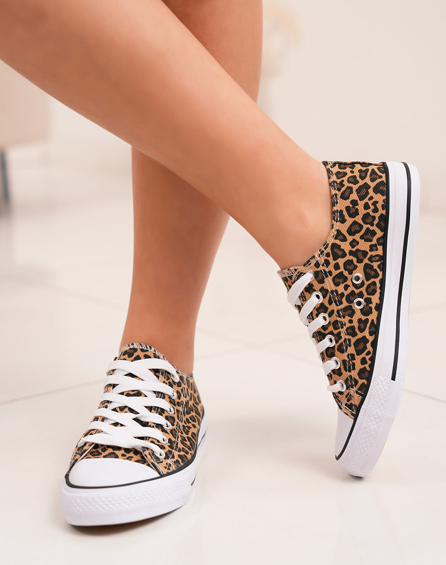 Baskets femme basses tendance à imprimé léopard et semelle blanche