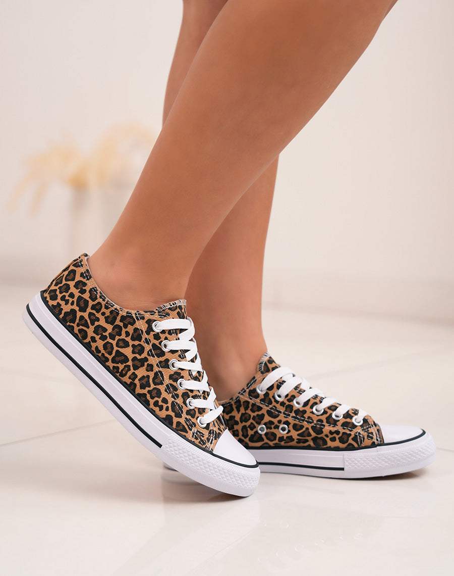 Baskets femme basses tendance à imprimé léopard et semelle blanche