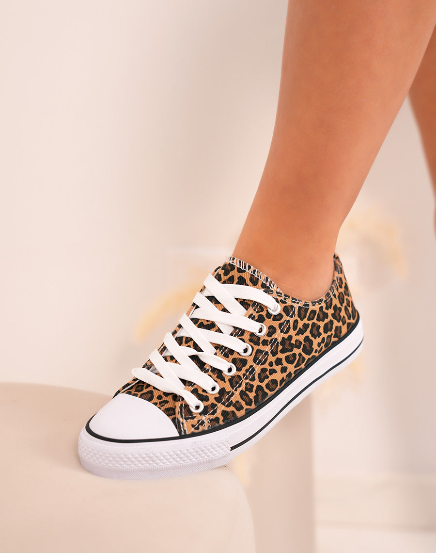 Baskets femme basses tendance à imprimé léopard et semelle blanche