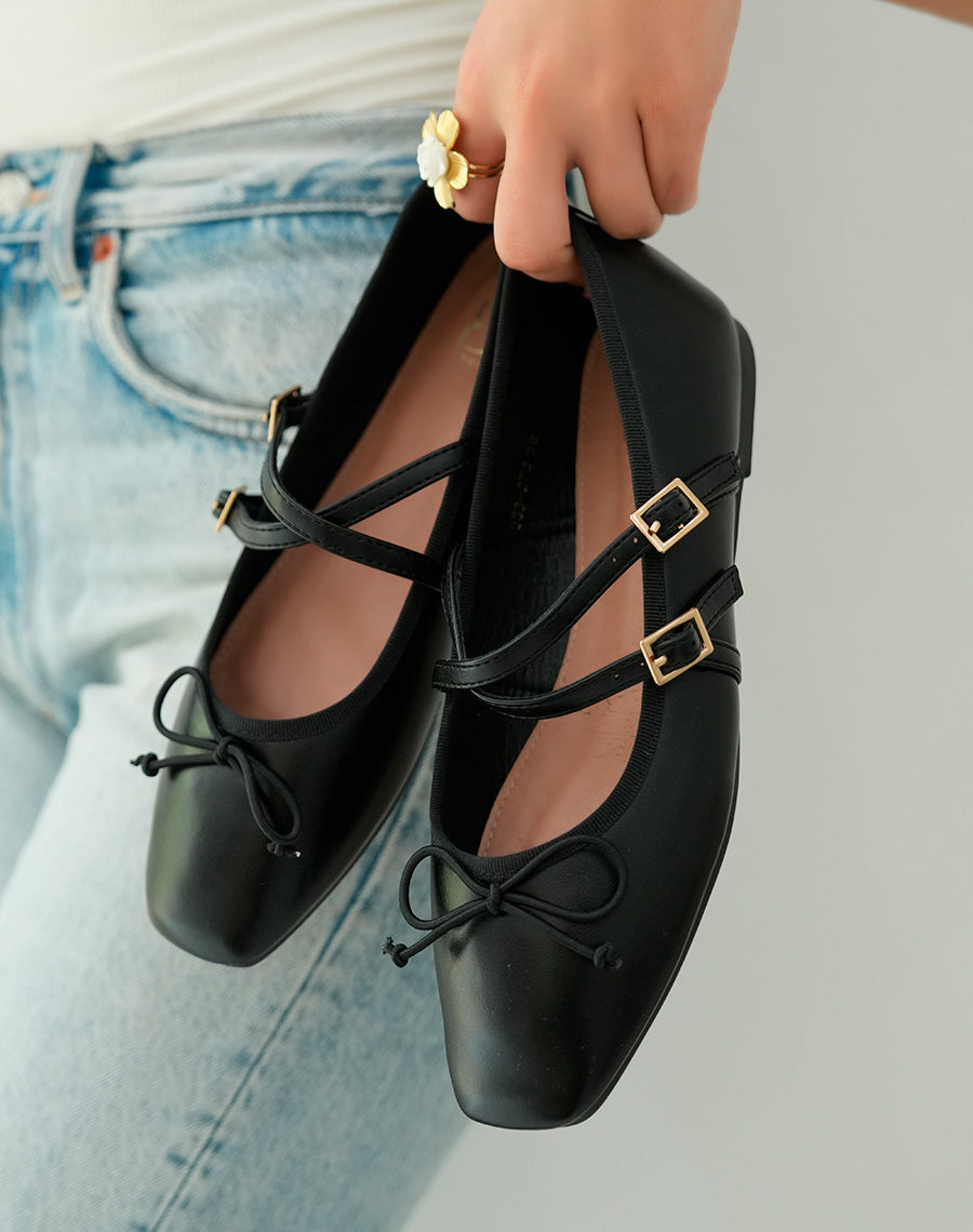 Ballerines noires sophistiquées avec double lanière et noeud délicat