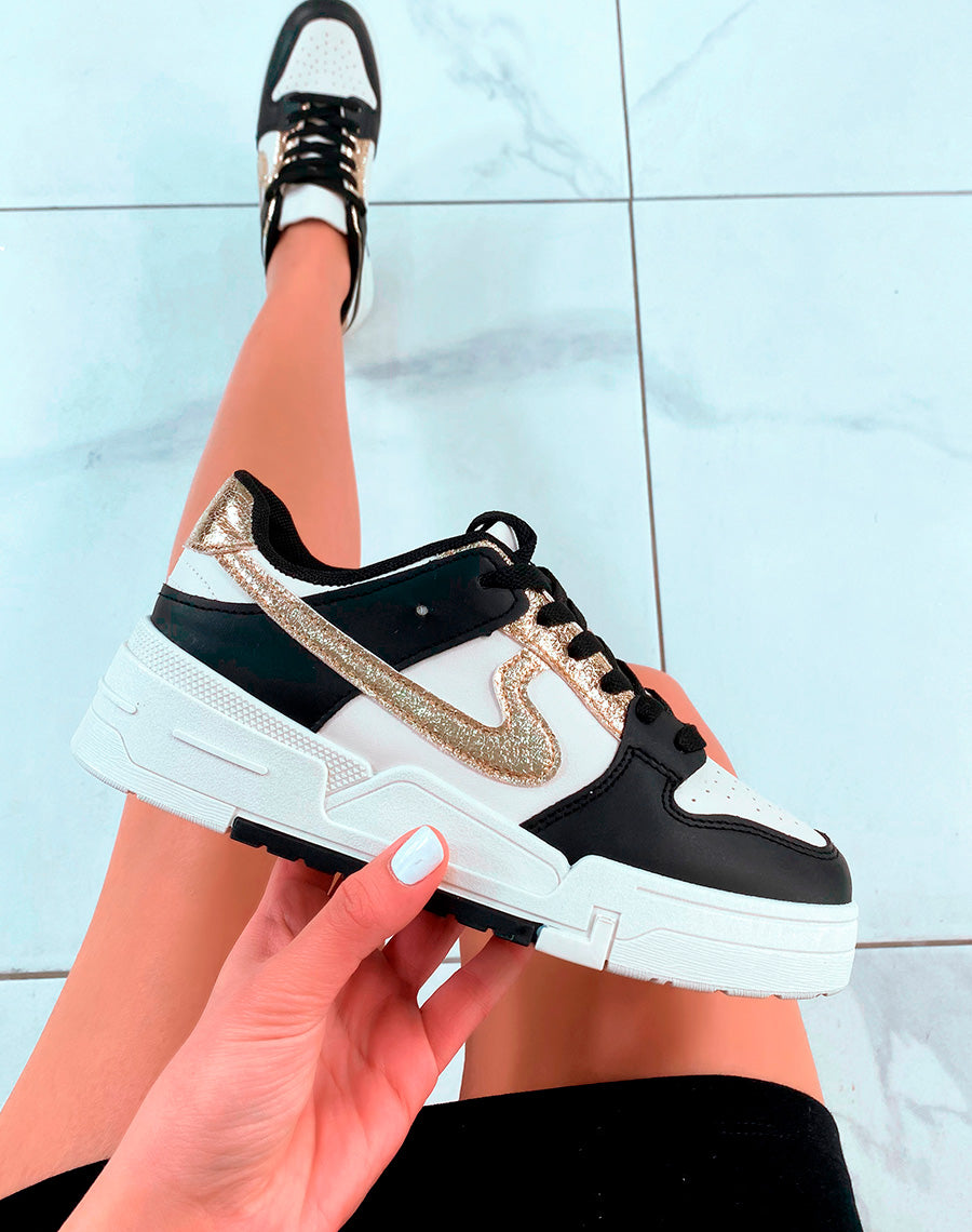 Basket beiges à empiècements noirs et dorées