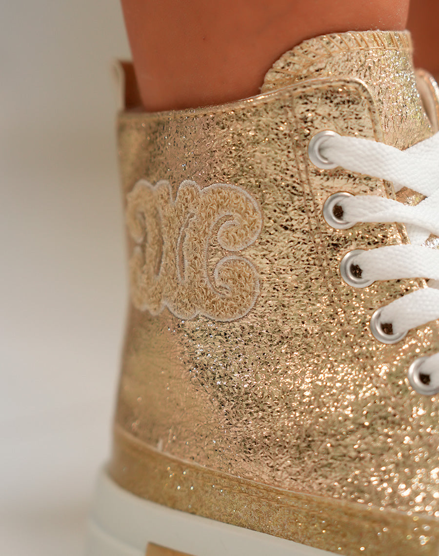 Basket montante femme dorée brillante avec logo en tissu
