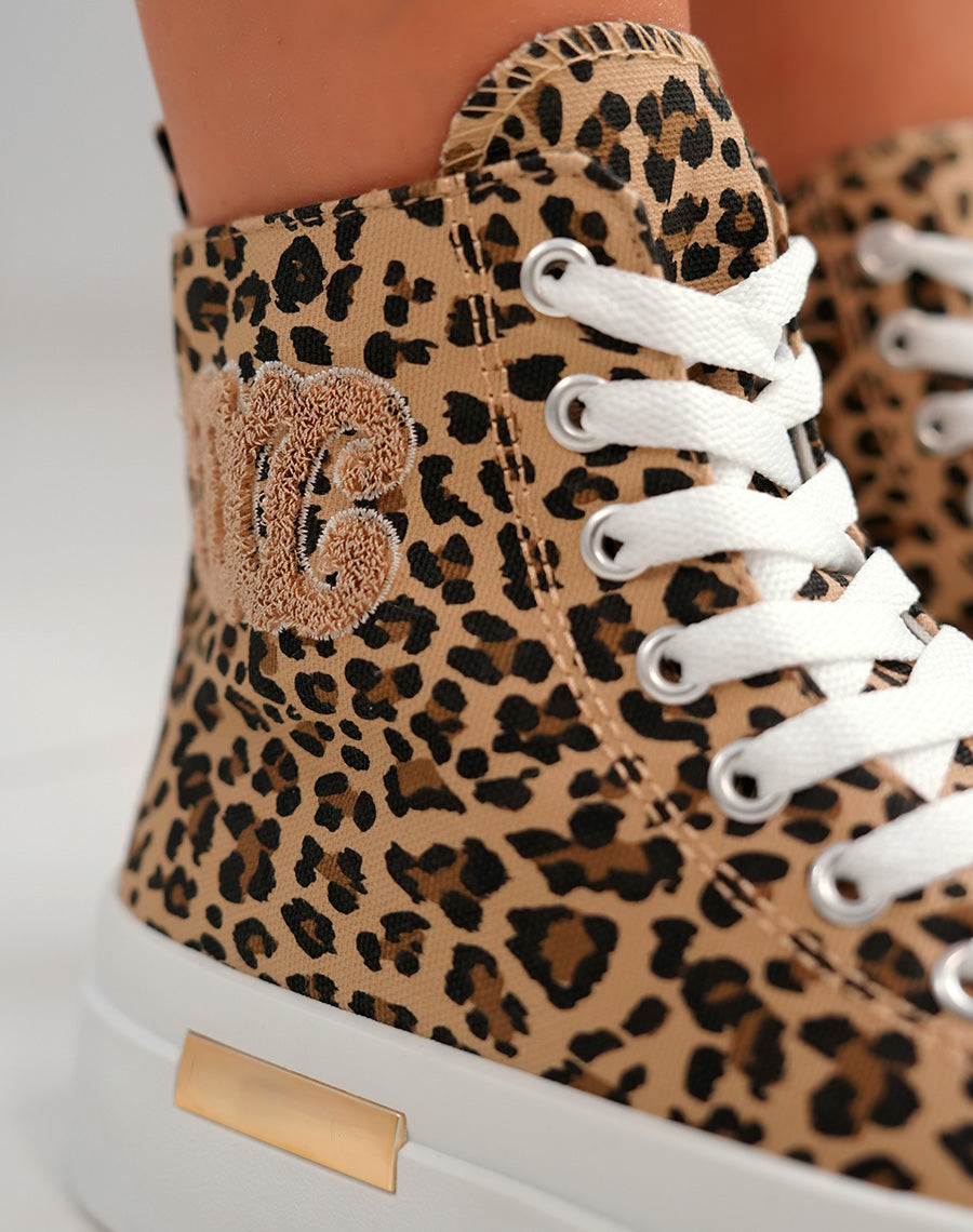 Basket montante femme imprimé léopard avec logo en tissu