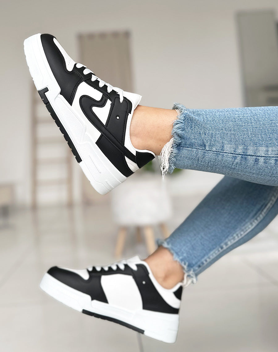 Baskets blanches et noirs