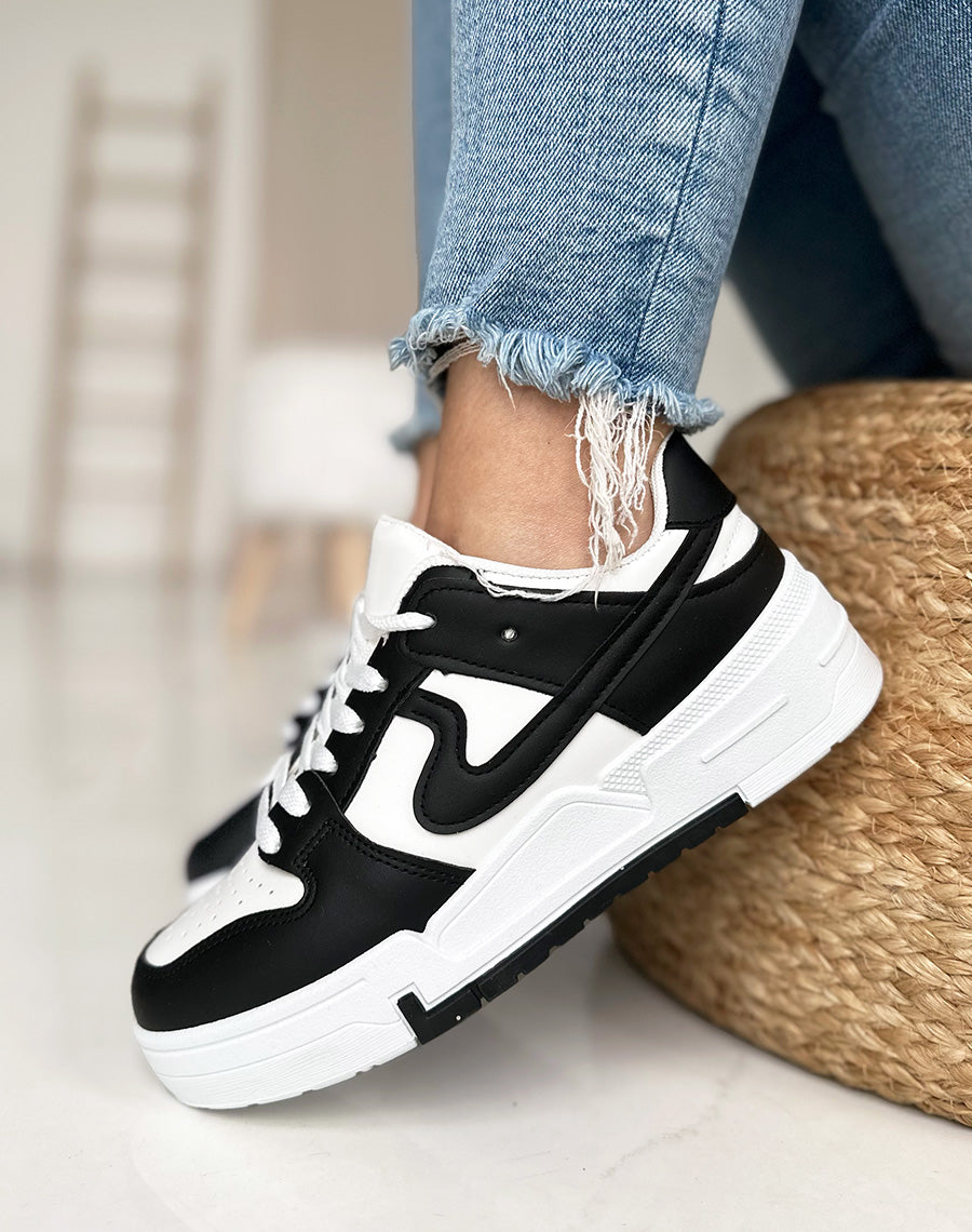 Baskets blanches et noirs