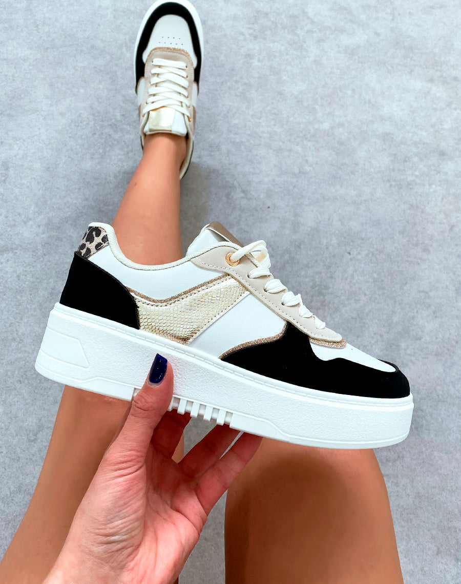 Baskets femme bi-couleurs noires à empiècements et détail léopard