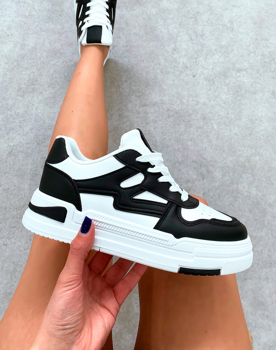 Baskets femme bi-couleurs noires et blanche à lacets