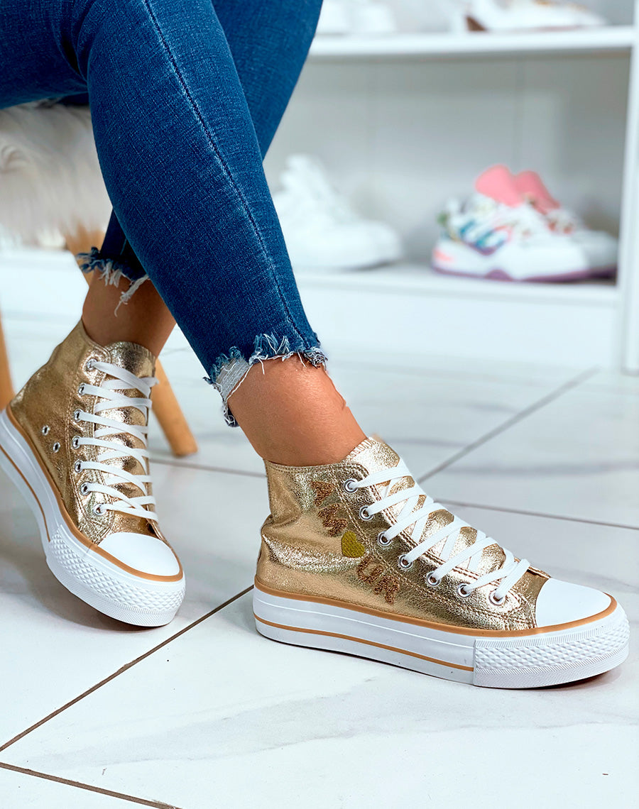 Baskets montantes dorées à lacets