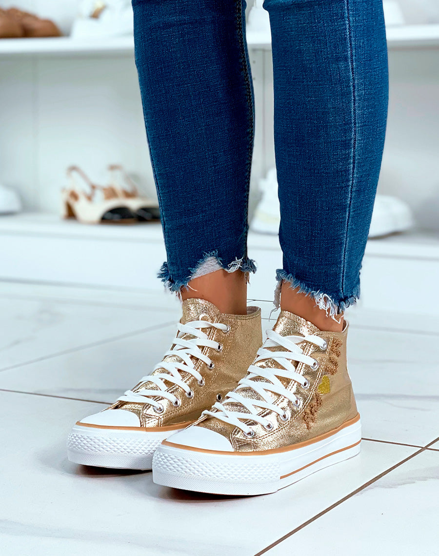 Baskets montantes dorées à lacets