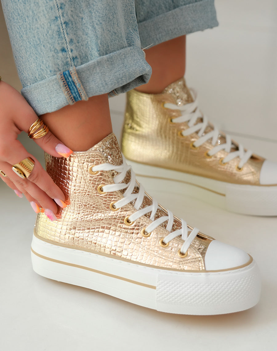 Baskets montantes dorées à semelle épaisse