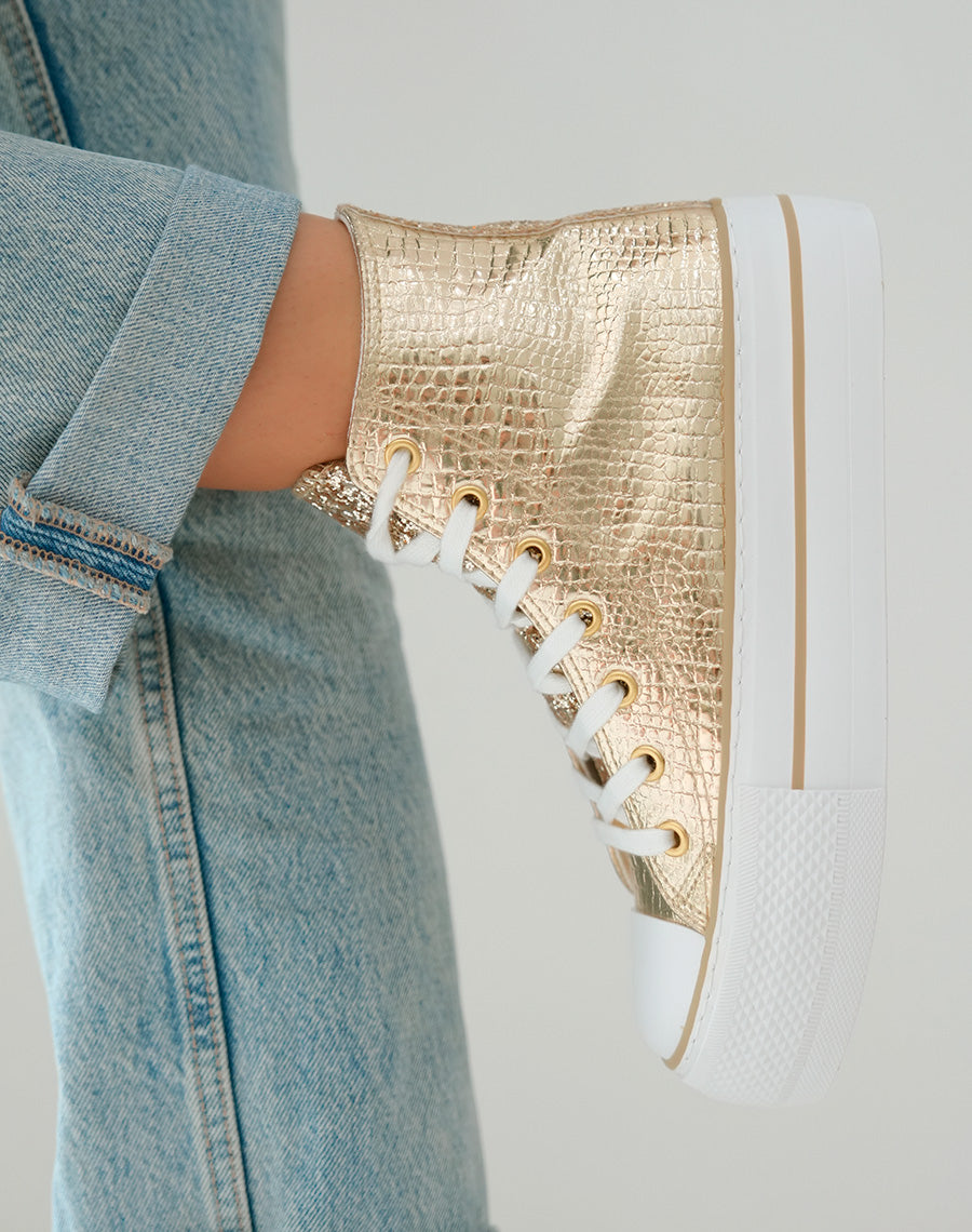 Baskets montantes dorées à semelle épaisse