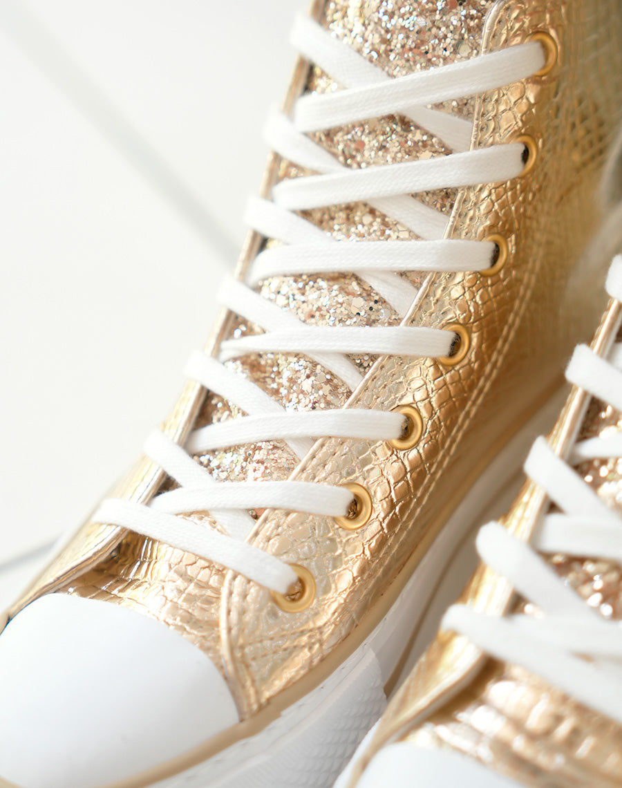 Baskets montantes dorées à semelle épaisse
