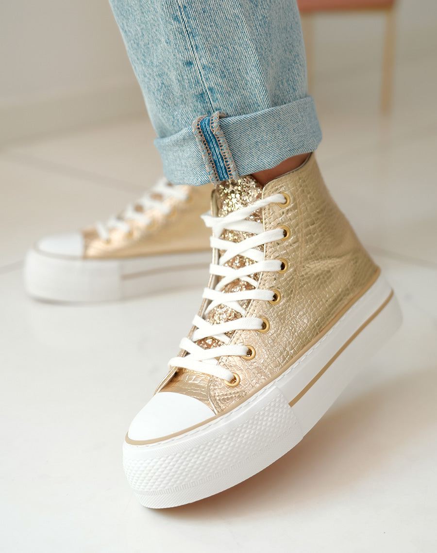 Baskets montantes dorées à semelle épaisse