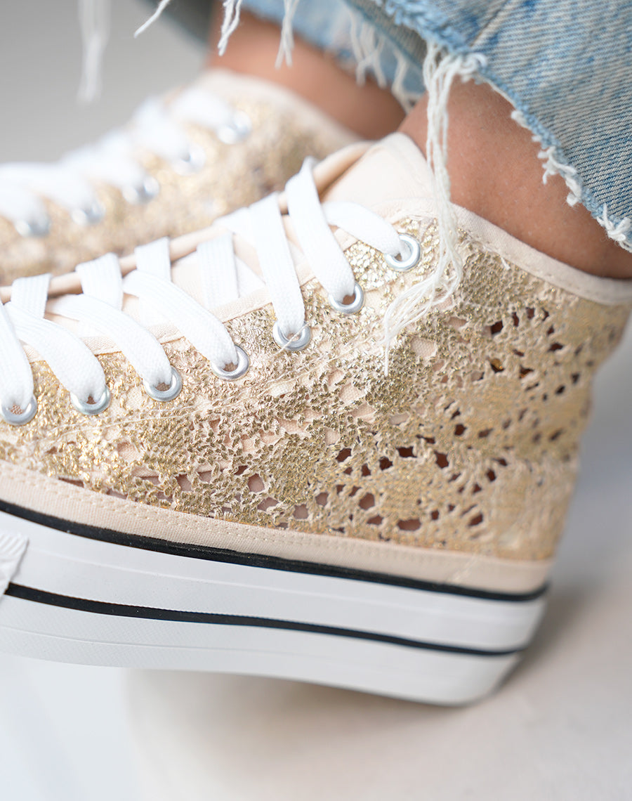Baskets montantes femme dorées pailletées avec effet crochet et plateforme à liseré noir