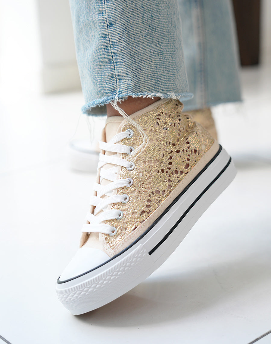Baskets montantes femme dorées pailletées avec effet crochet et plateforme à liseré noir