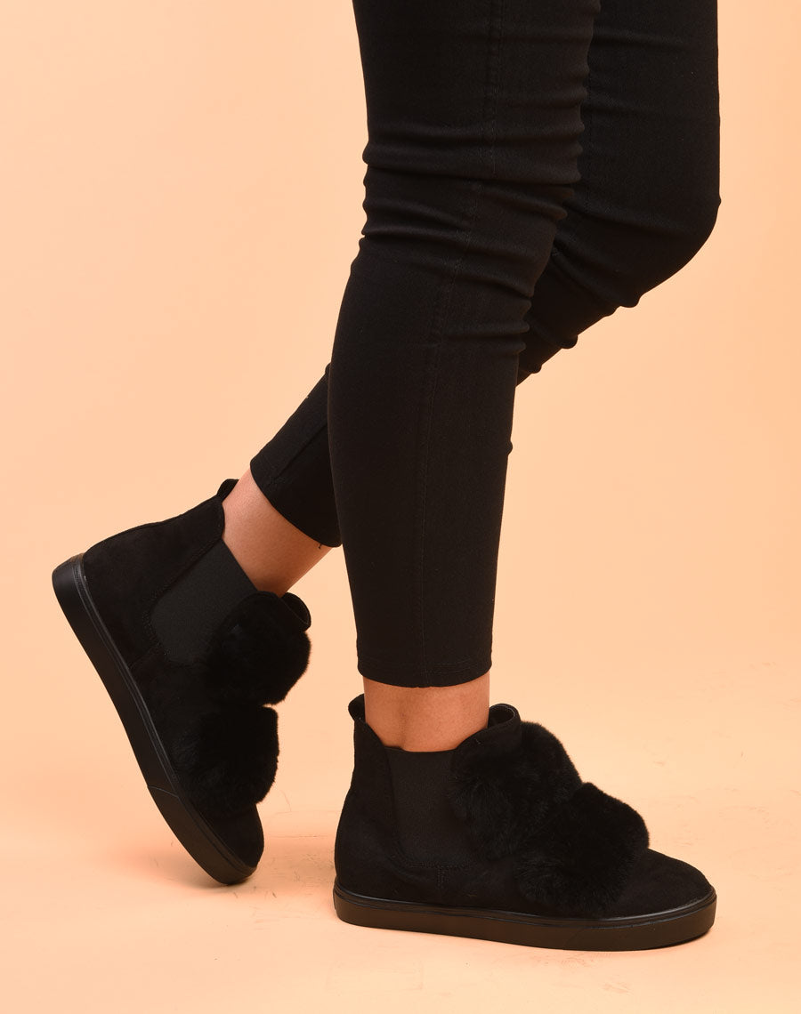 Baskets montantes noires avec moumoutes et élastiques