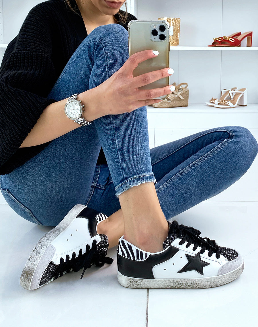 Baskets noires et blanches à détails pailletés et zébrés
