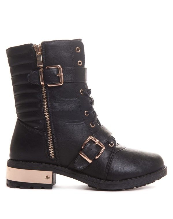 Boots godillot noire avec détails métalliques dorés
