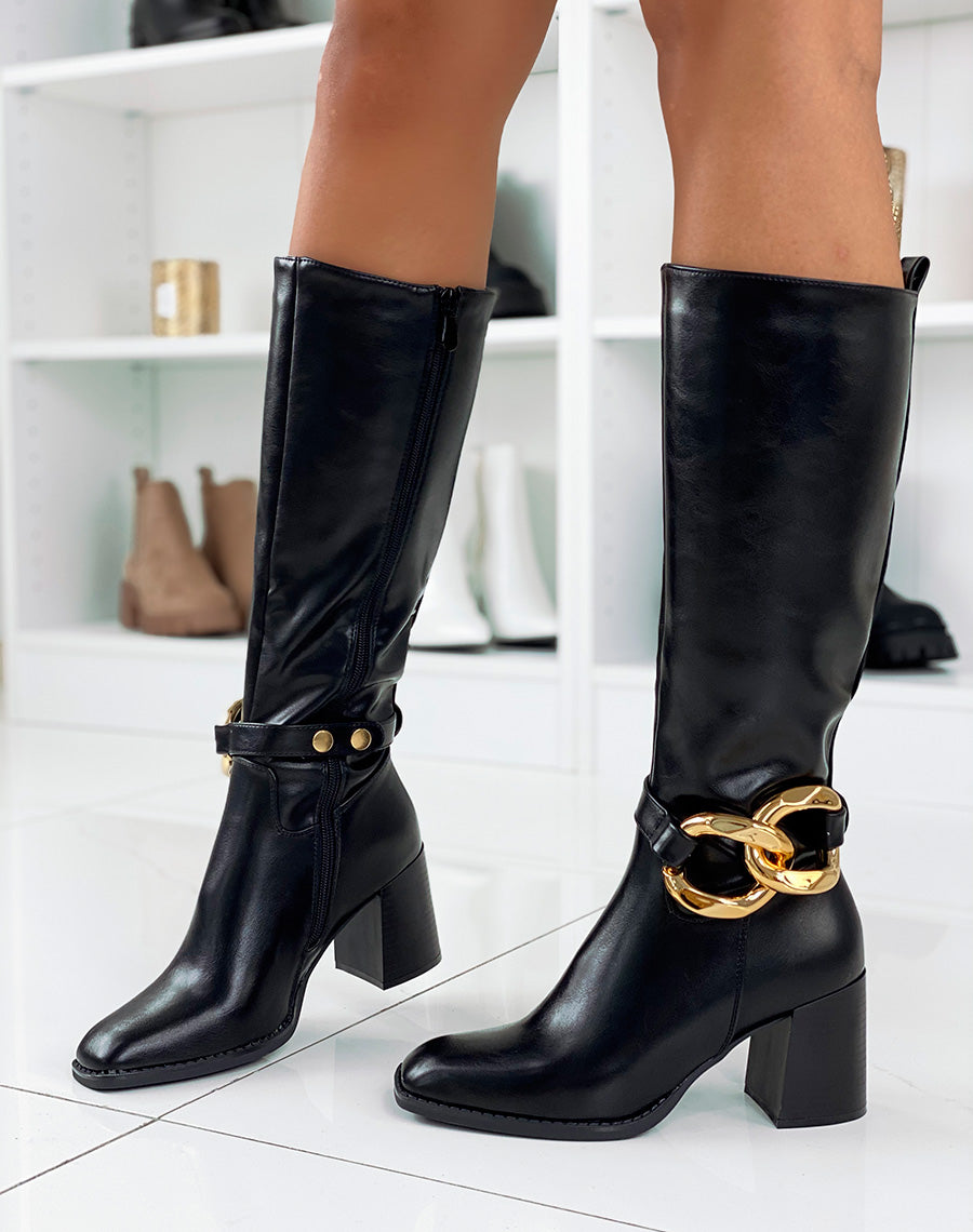 Bottes hautes à talon noires ornées d’une chaîne dorée
