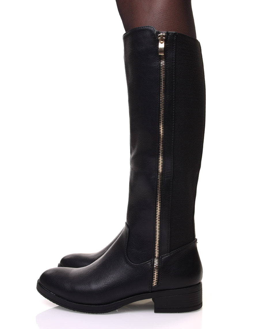 Bottes noires avec fermeture éclair dorée