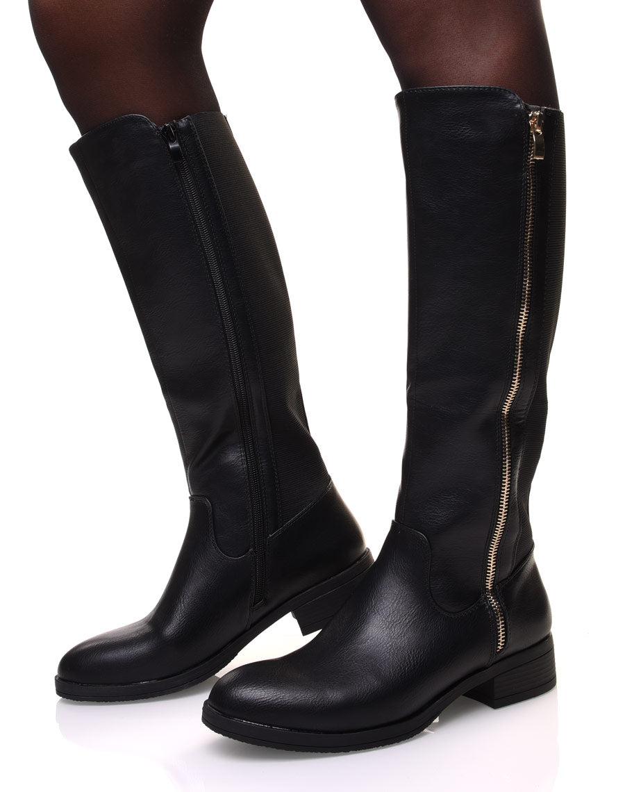 Bottes noires avec fermeture éclair dorée