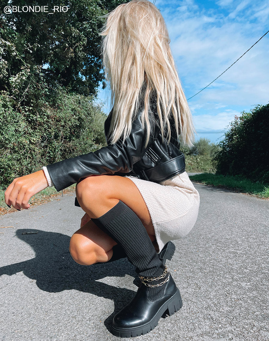 Bottes noires montantes effet chaussette à fines chaines dorées