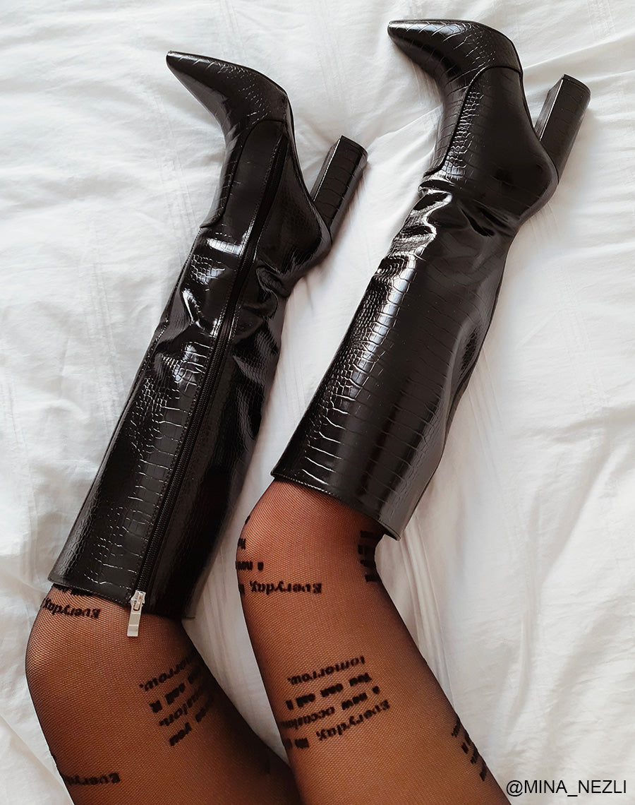 Bottes pointu effet croc à talon